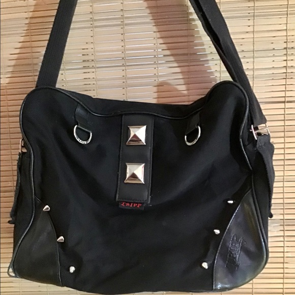 Tripp nyc Handbags - 💥🎸TRIPP🎸💥Bag💥all hardware intact🎸purse books